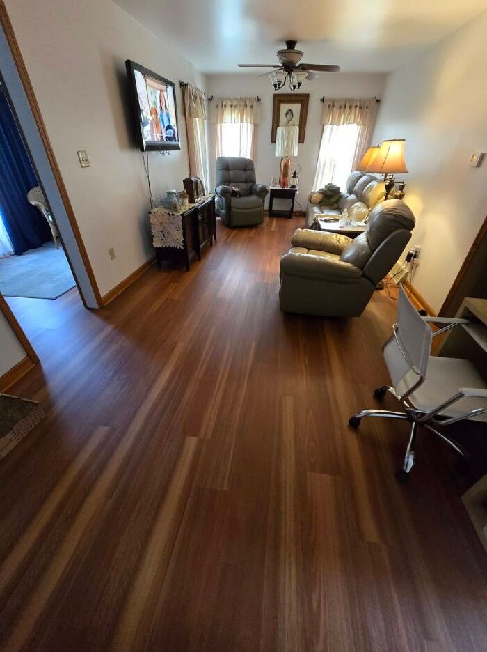 Warm brown flooring in a furnished living room